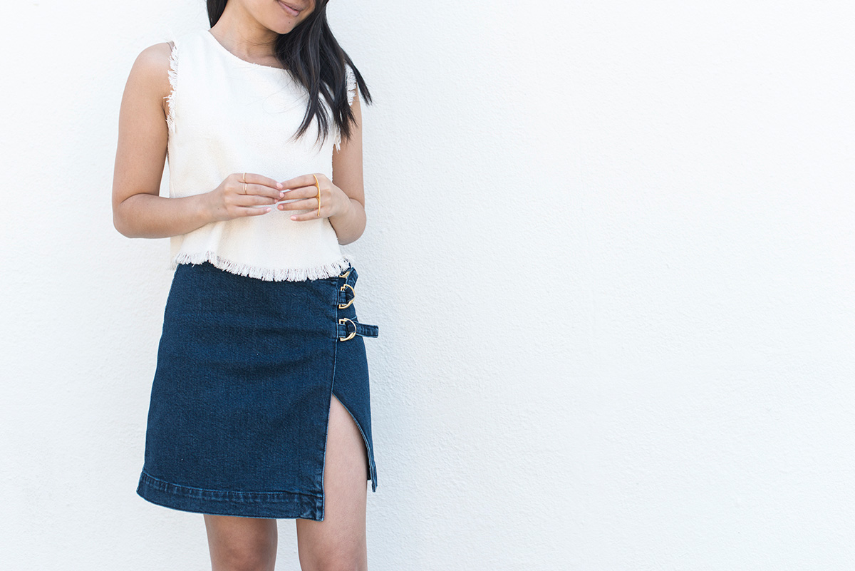 denim mini skirt with buckles