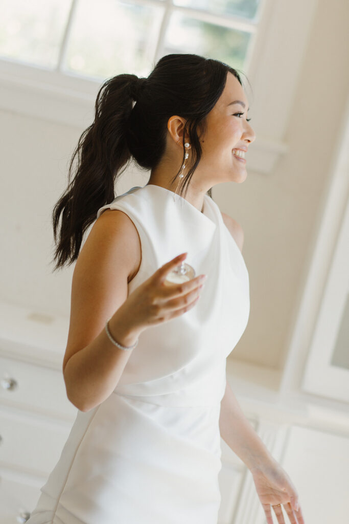 Stephanie getting ready before the wedding. Photo by Nicole Donnelly.